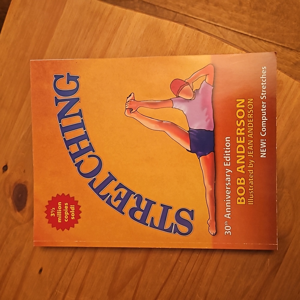 Softcover book. Stretching by Bob Anderson. 30th Anniversary Edition